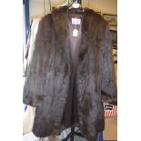 A vintage brown mink coat bearing Luxurstyle label to inside,