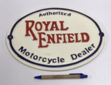 A modern painted cast metal sign "Royal Enfield",