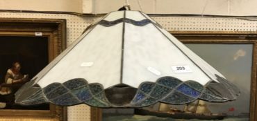 A pair of modern Tiffany style coloured glass octagonal ceiling light shades and fittings,