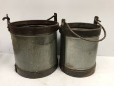 Two large galvanised and studded steel swing handled buckets largest 35 cm high