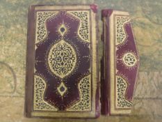 A 19th Century copy of the Koran (Qur'an) comprising 87 hand calligraphed and gilded panels,