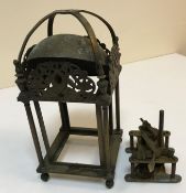 A brass lantern clock style clock case and a German clock movement,