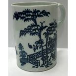 An 18th Century Worcester blue and white mug decorated with bamboo and fence pattern,