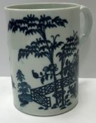An 18th Century Worcester blue and white mug decorated with bamboo and fence pattern,
