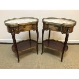 A pair of modern kidney shaped tables in the Continental manner,