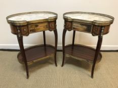 A pair of modern kidney shaped tables in the Continental manner,
