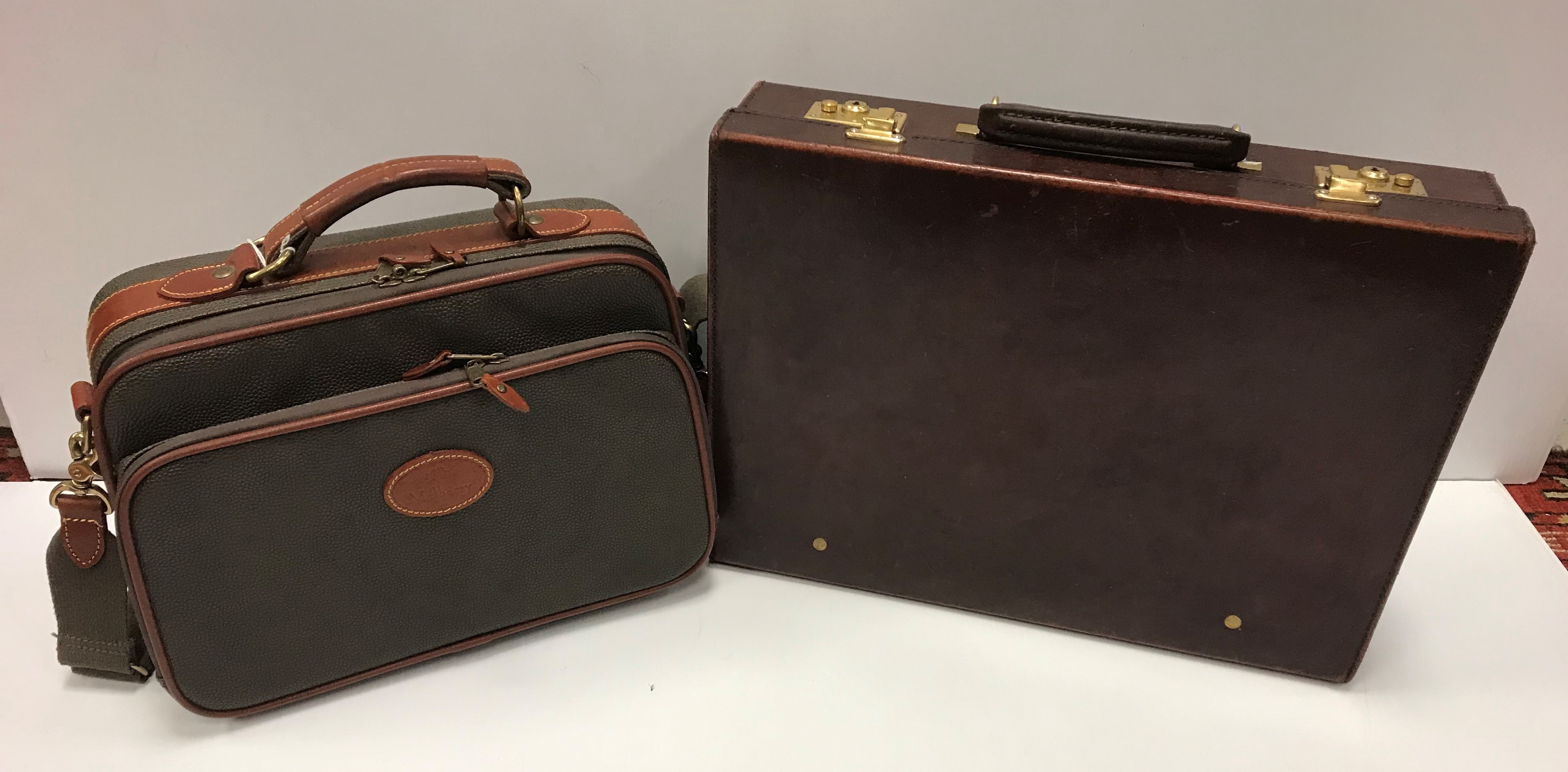 A Mulberry laptop / carry on bag, the inside tag No'd, 069943,