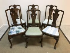 A set of six early to mid 20th Century walnut dining chairs in the early 18th Century manner,