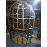 A gilt framed wall mirror as a cage in the Medieval taste,