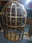 A gilt framed wall mirror as a cage in the Medieval taste,