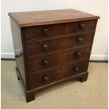 A 19th Century mahogany chest, the plain top with applied moulded edge,