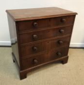 A 19th Century mahogany chest, the plain top with applied moulded edge,