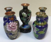 A pair of modern Chinese cloisonne blue ground and floral decorated vases, 15 cm high, two similar,