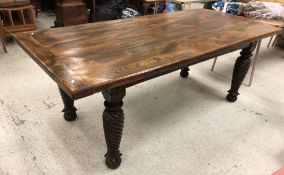 A refectory style dining table, the elm plank top with cleated ends,