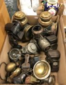 A collection of various vehicle lamps including a pair of GPO brass and black painted lamps,