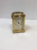 A modern Rapport brass cased carriage clock in the Victorian style, 11.5 cm high x 8 cm wide x 7.