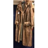 A pale brown full length mink coat, bearing label to the interior "H.
