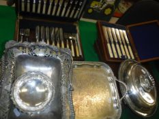 A collection of plated wares comprising an entree dish, swing handled basket, twin-handled tray,