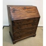 A late George III mahogany bureau,