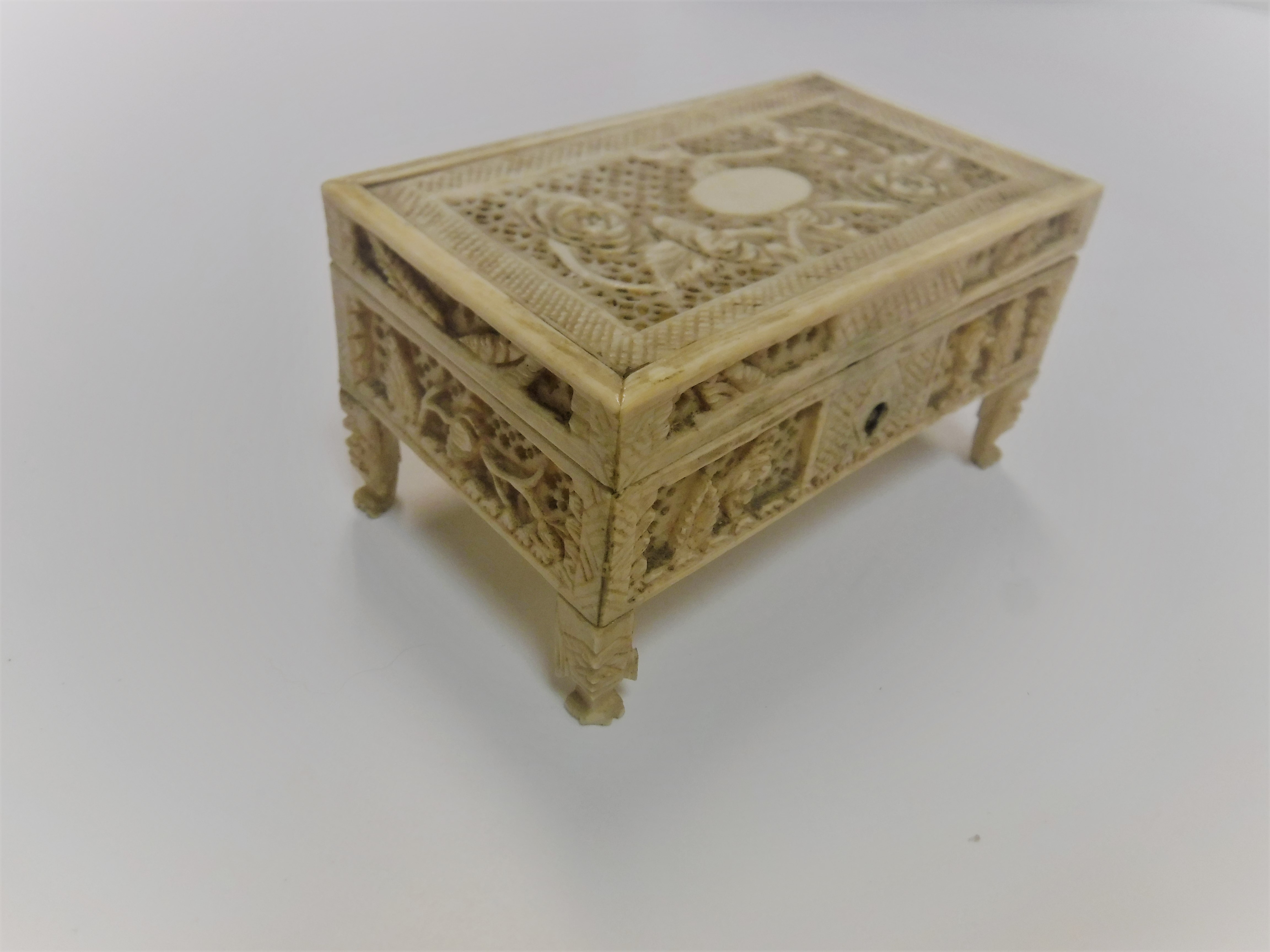 A 19th Century Chinese ivory cricket cage of rectangular form with pierced foliate decoration, - Image 2 of 2