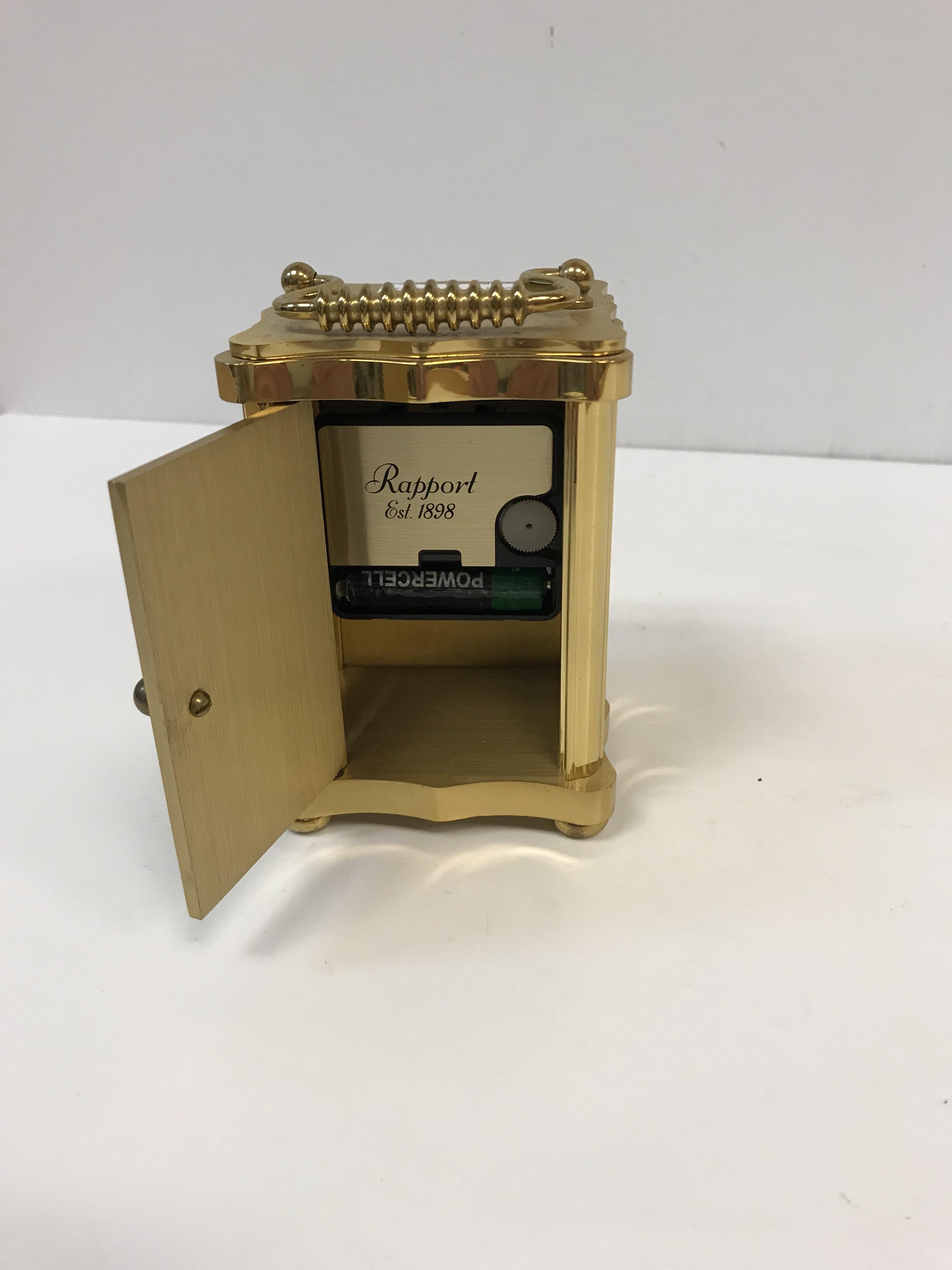 A modern Rapport brass cased carriage clock in the Victorian style, 11.5 cm high x 8 cm wide x 7. - Image 2 of 2