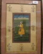 20TH CENTURY MUGHAL SCHOOL "Gentleman in yellow robes, holding a flower in his right hand,