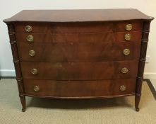 A 20th Century mahogany bow fronted chest in the Regency taste,