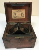 A 19th Century mahogany cased artificial mercury horizon by J Hughes,