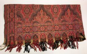 A Paisley shawl with tassle ends CONDITION REPORTS Approx 176cm x 176cm,