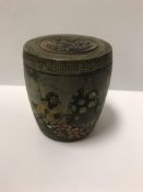 A Chinese porcelain lidded pot (possibly cricket cage), the top with pierced floral grille,