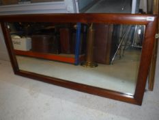 A mahogany framed rectangular wall mirror, 67 cm wide x 137 cm long x 3.