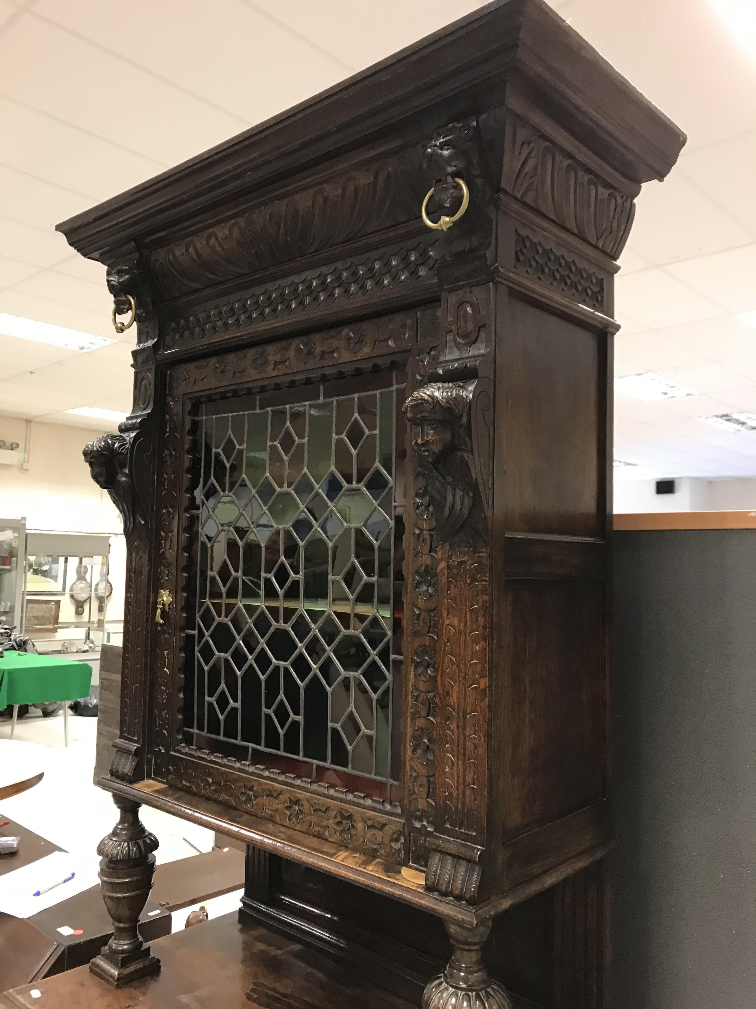 A Victorian carved oak Gothic Revival cabinet, - Image 13 of 24