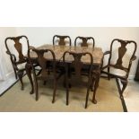 A late 20th Century walnut veneered extending dining table with single leaf,