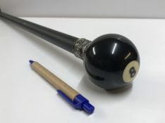 A decorative walking stick, the finial set as a No.