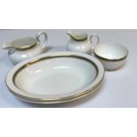 A Royal Doulton "Clarendon" pattern tea / dinner set (H4993) comprising six cups and saucers,