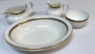 A Royal Doulton "Clarendon" pattern tea / dinner set (H4993) comprising six cups and saucers,