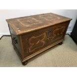 An oak and parquetry-inlaid coffer in th