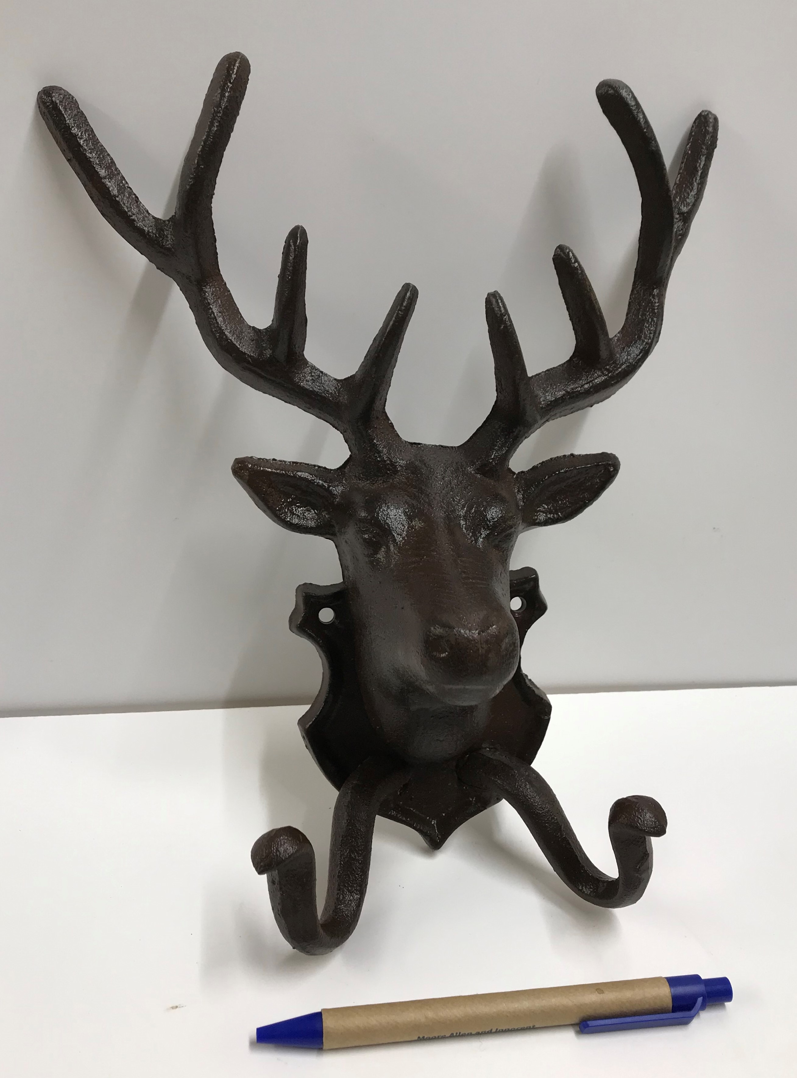 A deer head coat hook, approx 17 cm high