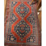 A Caucasian rug, the central panel set w