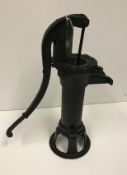 A cast iron vintage style garden pump, a