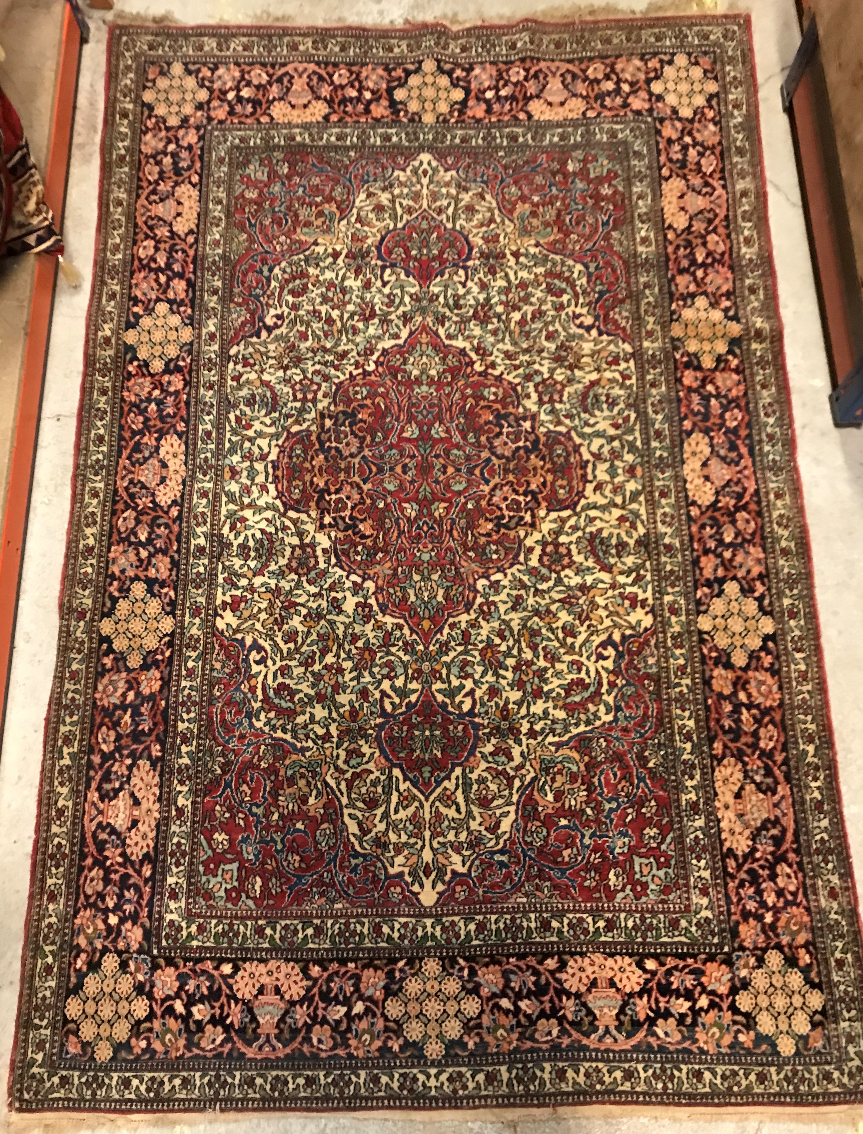 A fine Isphahan rug, the central panel s