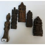 A collection of five ethnic carved woode