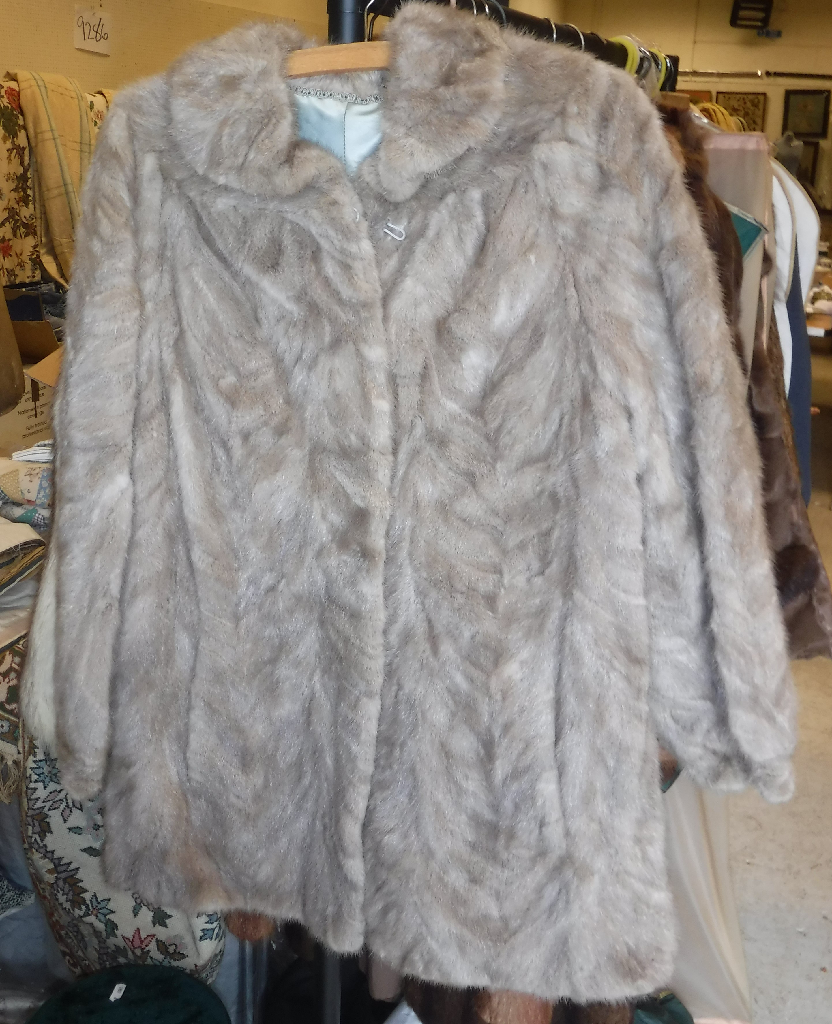 A brown mink jacket with satin lining, t