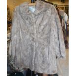 A brown mink jacket with satin lining, t