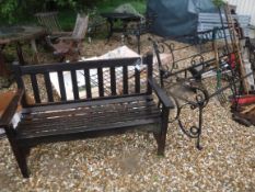 A wrought iron garden bench (no seat), bearing initials "EF", 183 cm long x 92 cm high, together