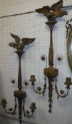 A pair of Regency style wall sconces, each with eagle surmount and acanthus leaf and scrolling