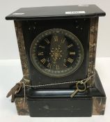 A late 19th Century slate and marble cased mantel clock, the eight day French movement with circular