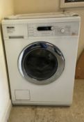 A Miele Honeycomb Care W5740 water control system washing machine