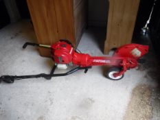 A Honda 4/Atom lawn edger, together with a petrol driven Macculloch strimmer and a Bosch generator