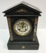 A 19th Century French marble and slate cased mantel clock of architectural form, the eight day